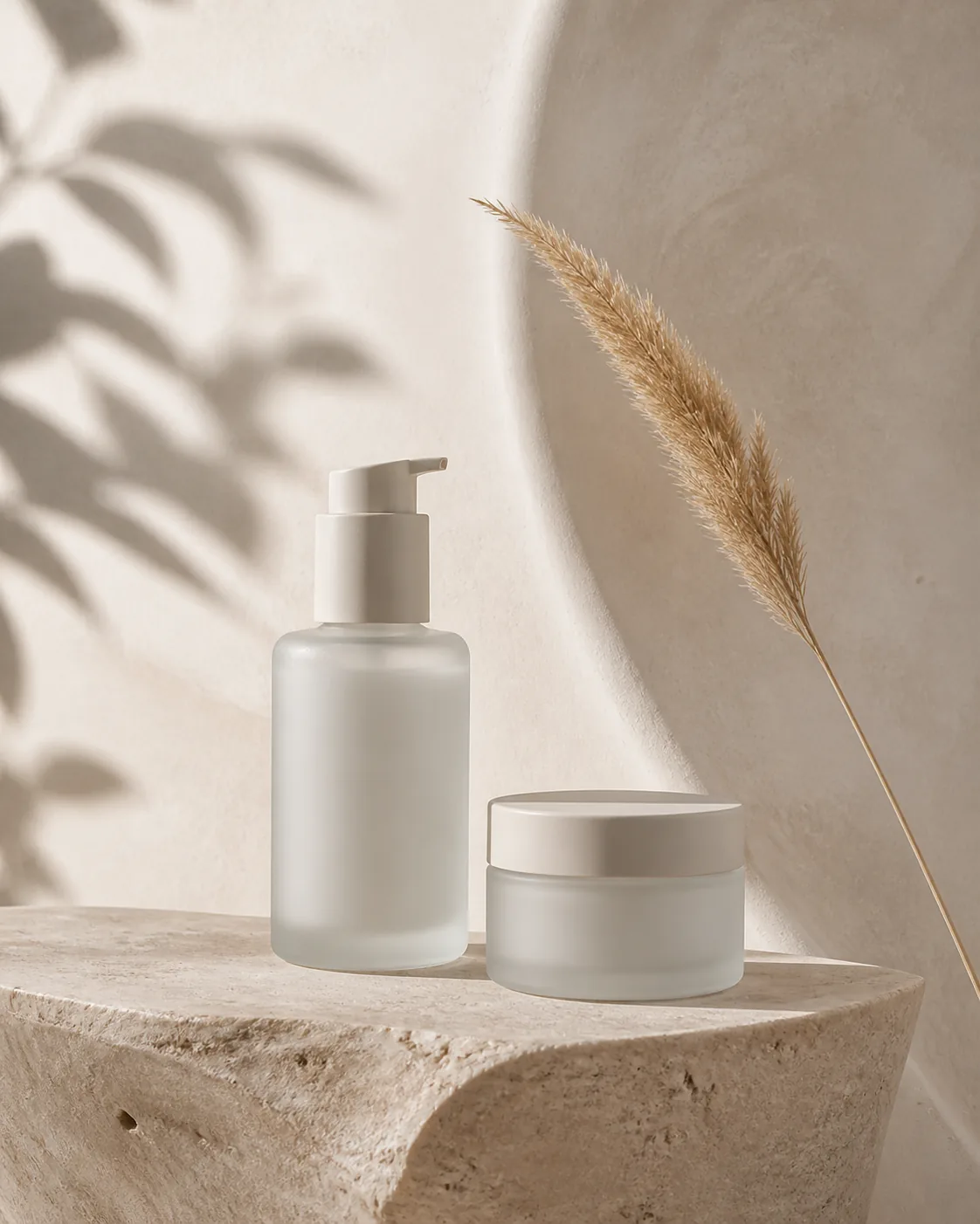 Unbranded skincare arranged on a stone pedestal